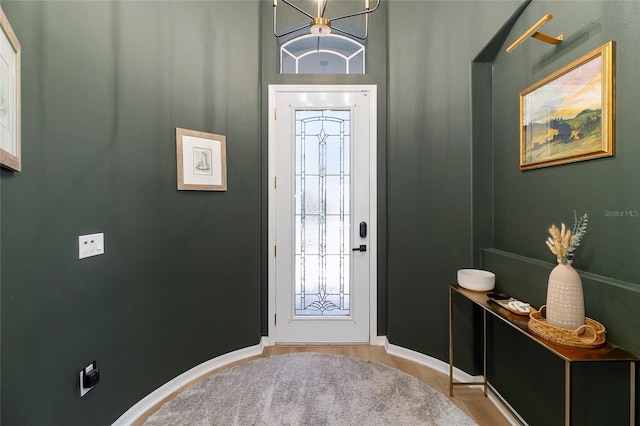 entryway with light hardwood / wood-style floors