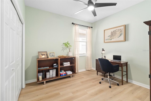 office with ceiling fan and light wood-type flooring