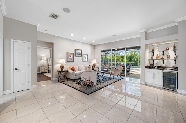 tiled living room featuring bar, crown molding, and beverage cooler