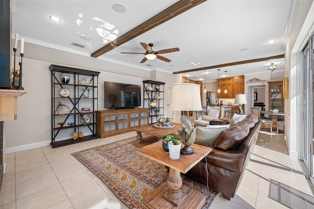 living room featuring ornamental molding, ceiling fan, and light tile patterned floors