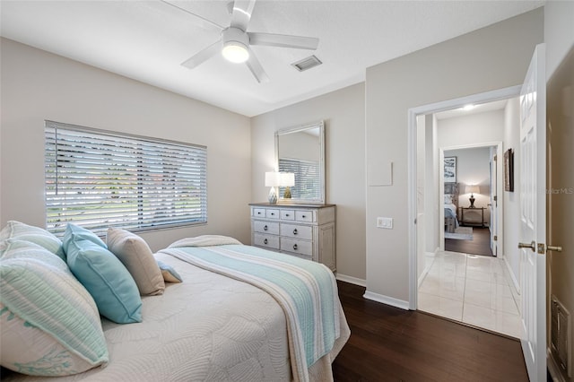 bedroom featuring dark wood-type flooring and ceiling fan