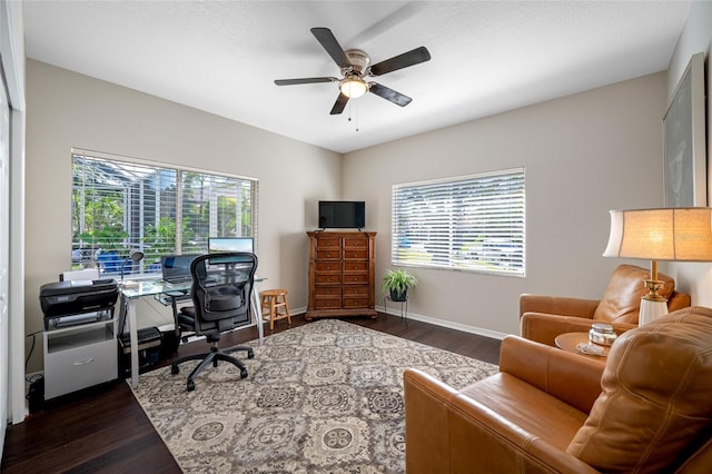 office with ceiling fan, a wealth of natural light, and dark hardwood / wood-style flooring