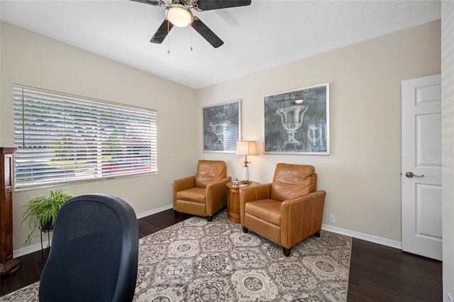 living area with ceiling fan and wood-type flooring