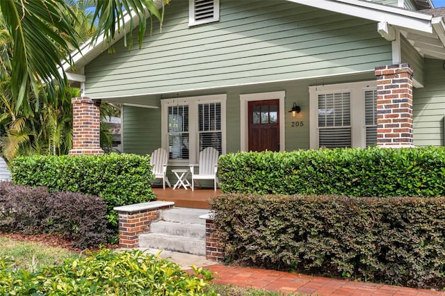 entrance to property with a porch