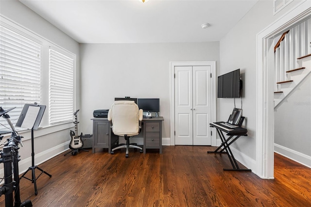 home office with dark wood-type flooring