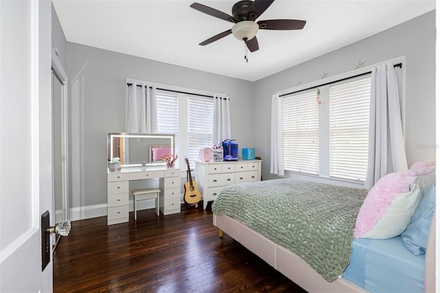 bedroom featuring ceiling fan and dark hardwood / wood-style flooring