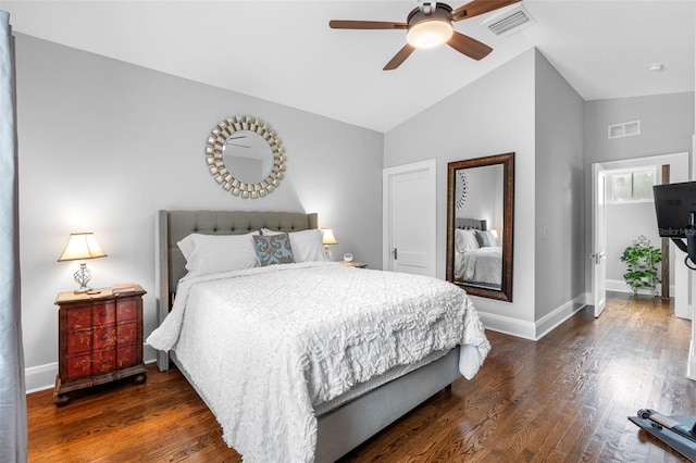 bedroom featuring lofted ceiling, dark hardwood / wood-style floors, and ceiling fan