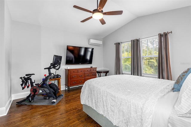 bedroom with ceiling fan, dark hardwood / wood-style floors, a wall mounted AC, and vaulted ceiling