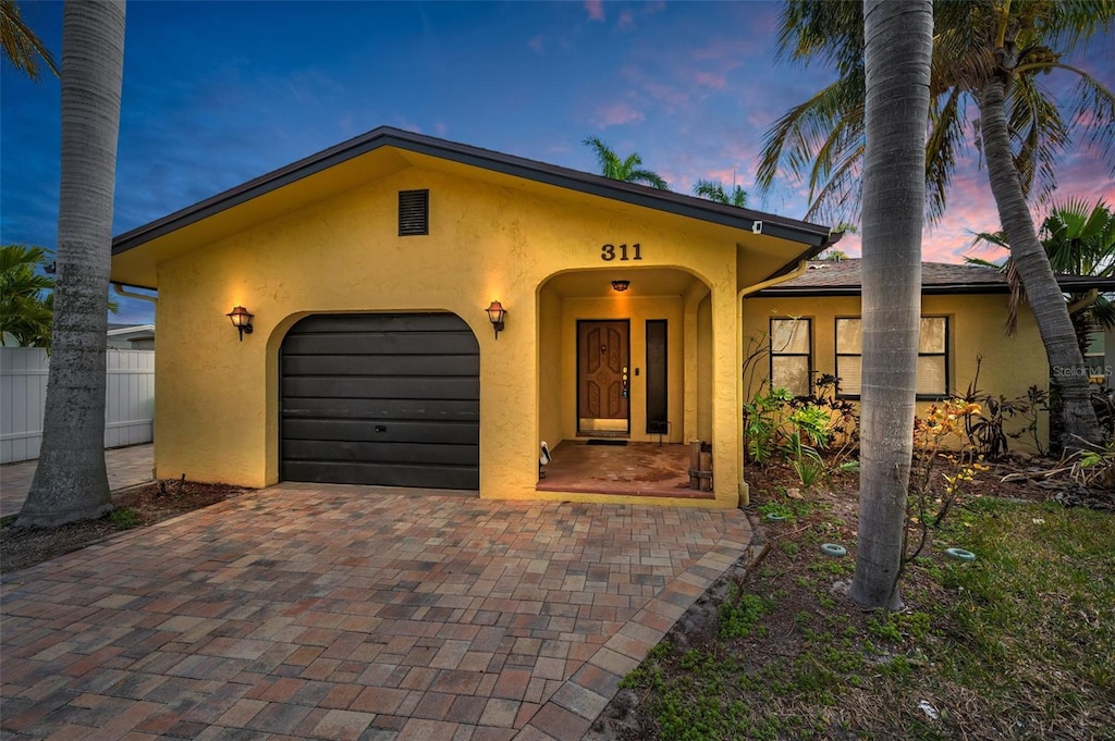 view of front of property featuring a garage