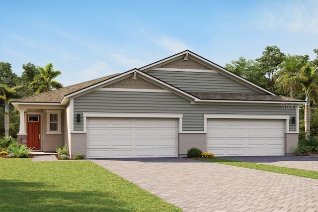 view of front facade featuring a garage and a front lawn