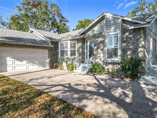 ranch-style home with a garage