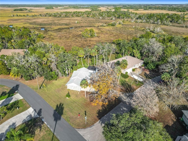 birds eye view of property featuring a rural view