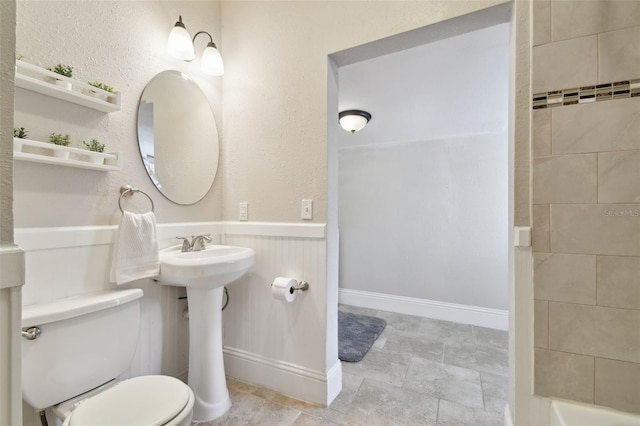 bathroom with sink and toilet