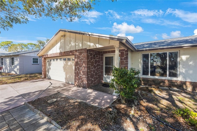 single story home featuring a garage