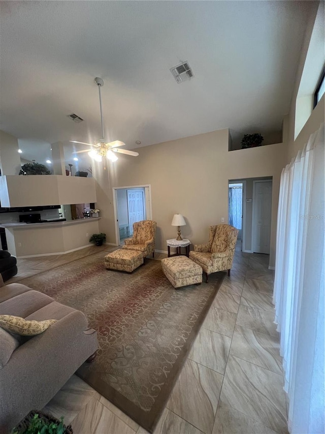 living room with ceiling fan