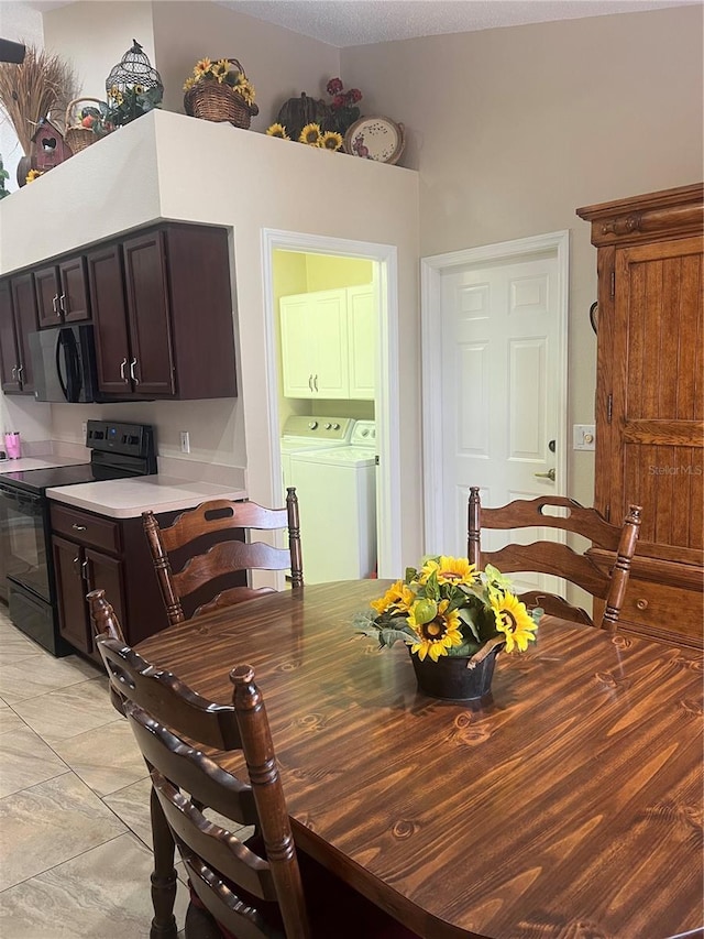 dining area with washing machine and clothes dryer