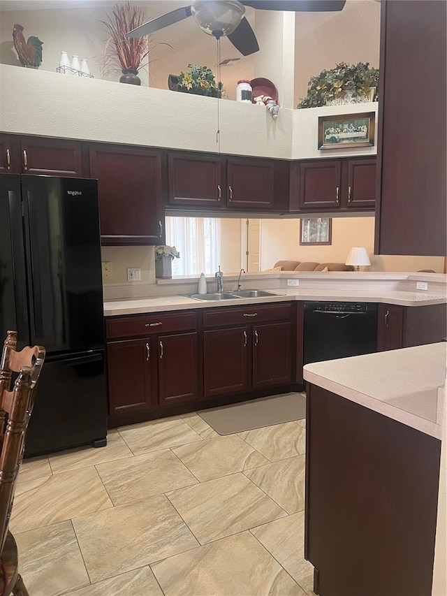 kitchen featuring ceiling fan, sink, and black appliances