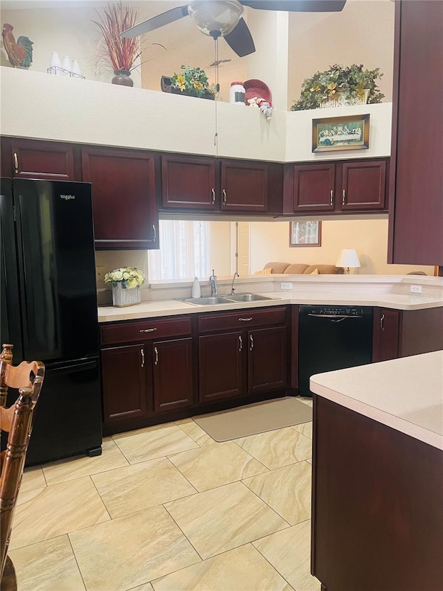 kitchen featuring ceiling fan, sink, and black appliances