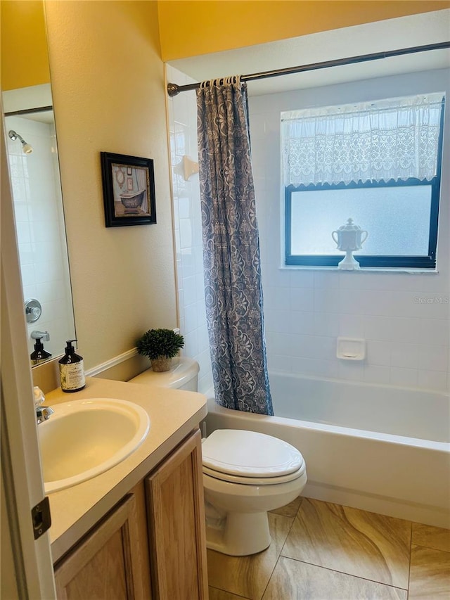 full bathroom featuring vanity, toilet, and shower / bath combo