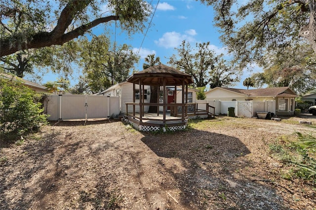 view of yard featuring a gazebo and a deck