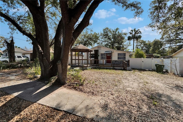 exterior space with a gazebo and a deck