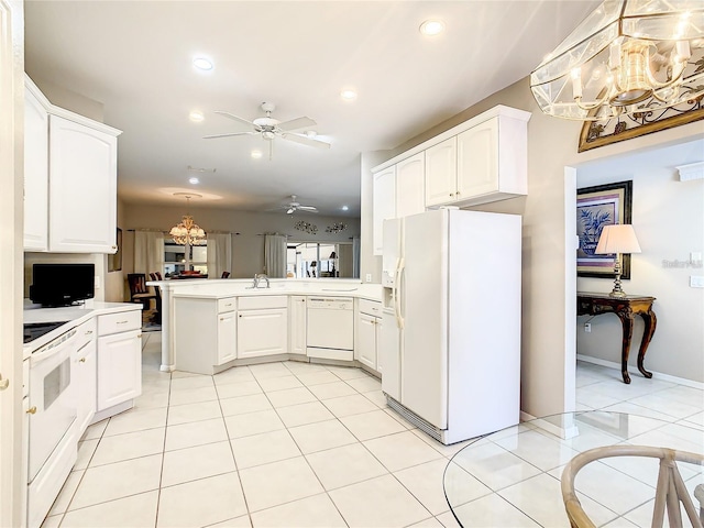 kitchen featuring white cabinetry, white appliances, kitchen peninsula, and hanging light fixtures