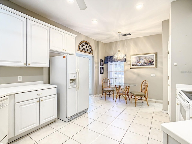 kitchen with white appliances, ceiling fan, white cabinetry, light tile patterned flooring, and decorative light fixtures