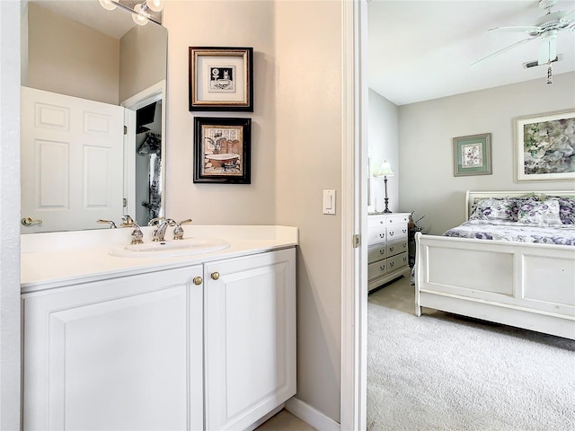 bathroom featuring vanity and ceiling fan