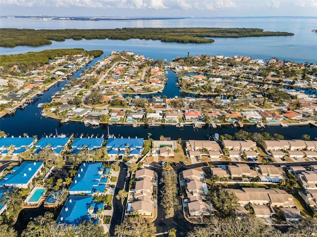 birds eye view of property featuring a residential view and a water view