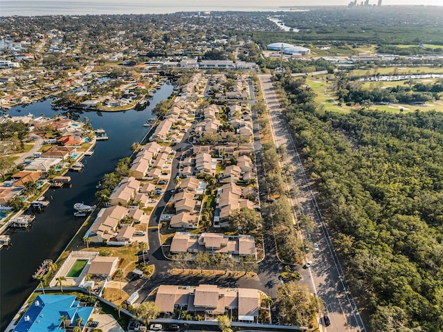 birds eye view of property featuring a residential view and a water view