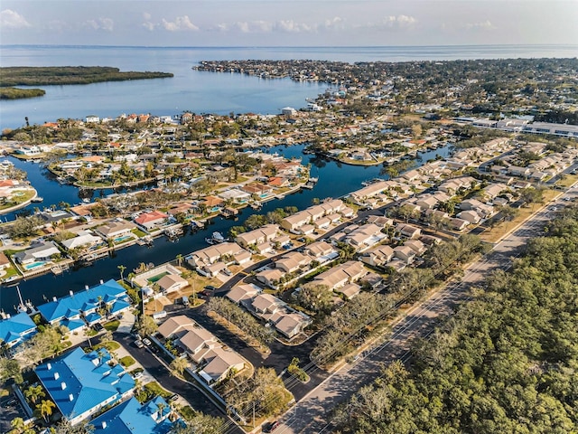 bird's eye view featuring a residential view and a water view