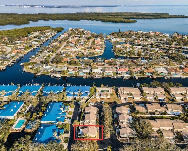 aerial view with a residential view and a water view