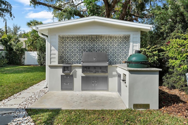 view of patio / terrace with a grill and exterior kitchen