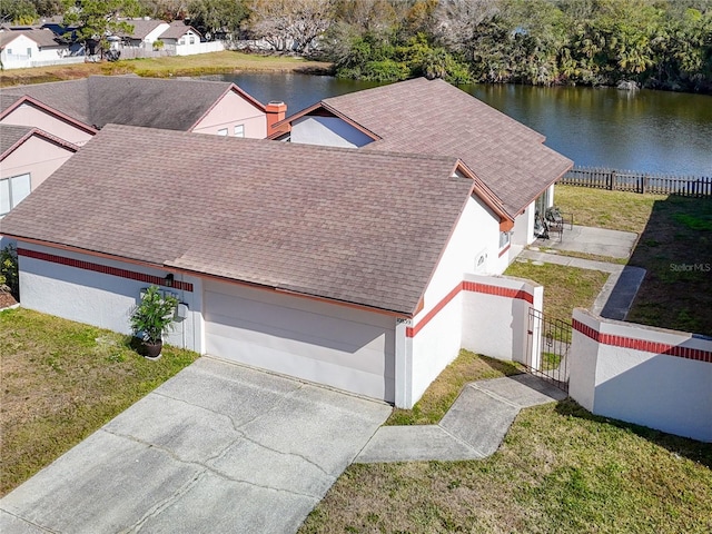 bird's eye view with a water view