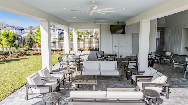 view of patio / terrace featuring an outdoor living space and ceiling fan