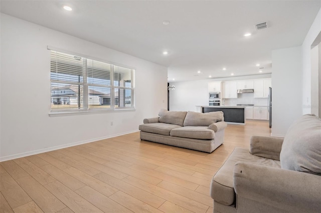 living room featuring light hardwood / wood-style flooring