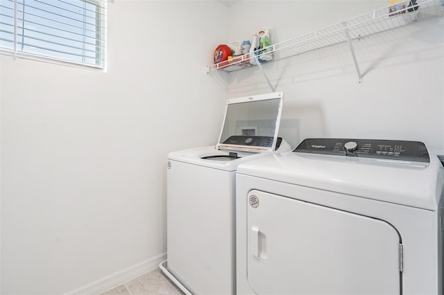 laundry room featuring washer and clothes dryer