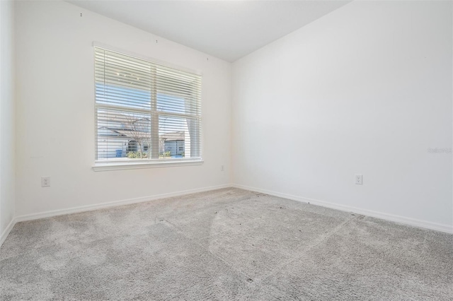 view of carpeted spare room