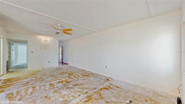 unfurnished room with ceiling fan