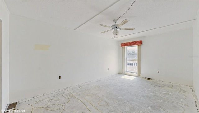 unfurnished room featuring a textured ceiling and ceiling fan