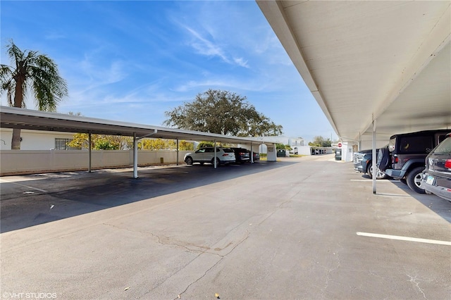 view of car parking featuring a carport