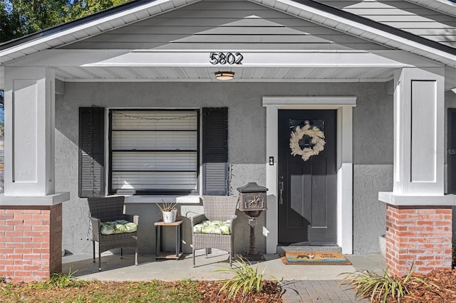 property entrance with a porch