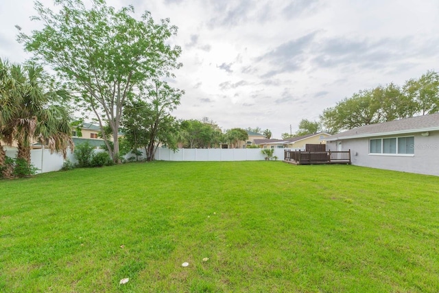 view of yard featuring a deck