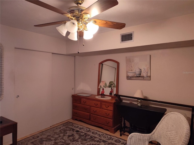 interior space featuring ceiling fan