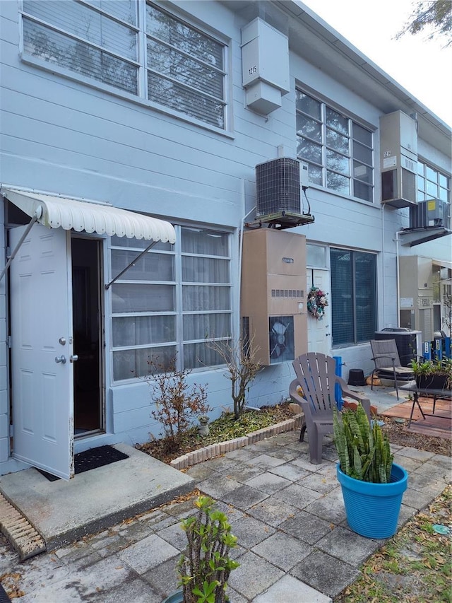 exterior space featuring a patio and central air condition unit