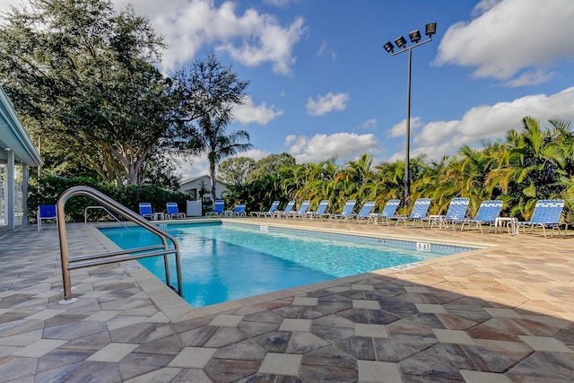 view of swimming pool featuring a patio