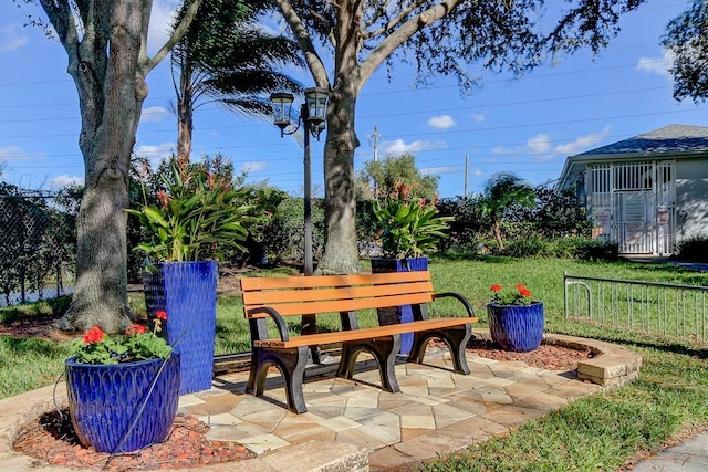 view of patio / terrace featuring fence