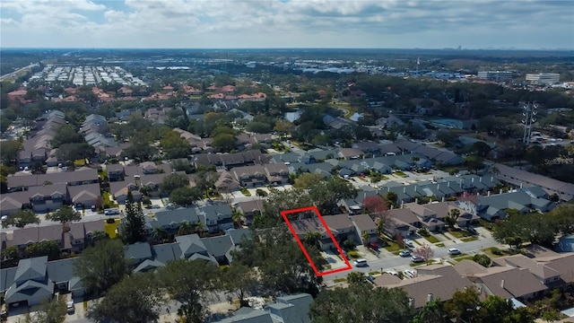 birds eye view of property with a residential view