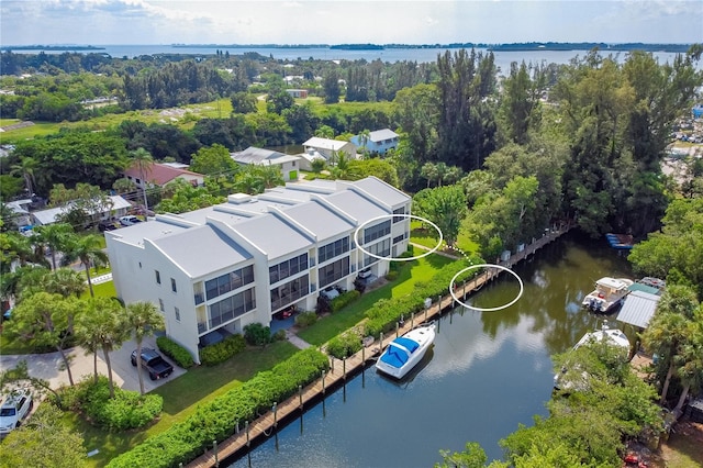 drone / aerial view with a water view