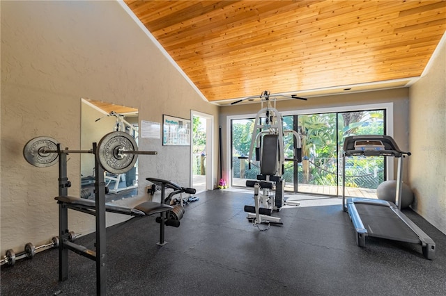 workout area with high vaulted ceiling, a wealth of natural light, and wood ceiling